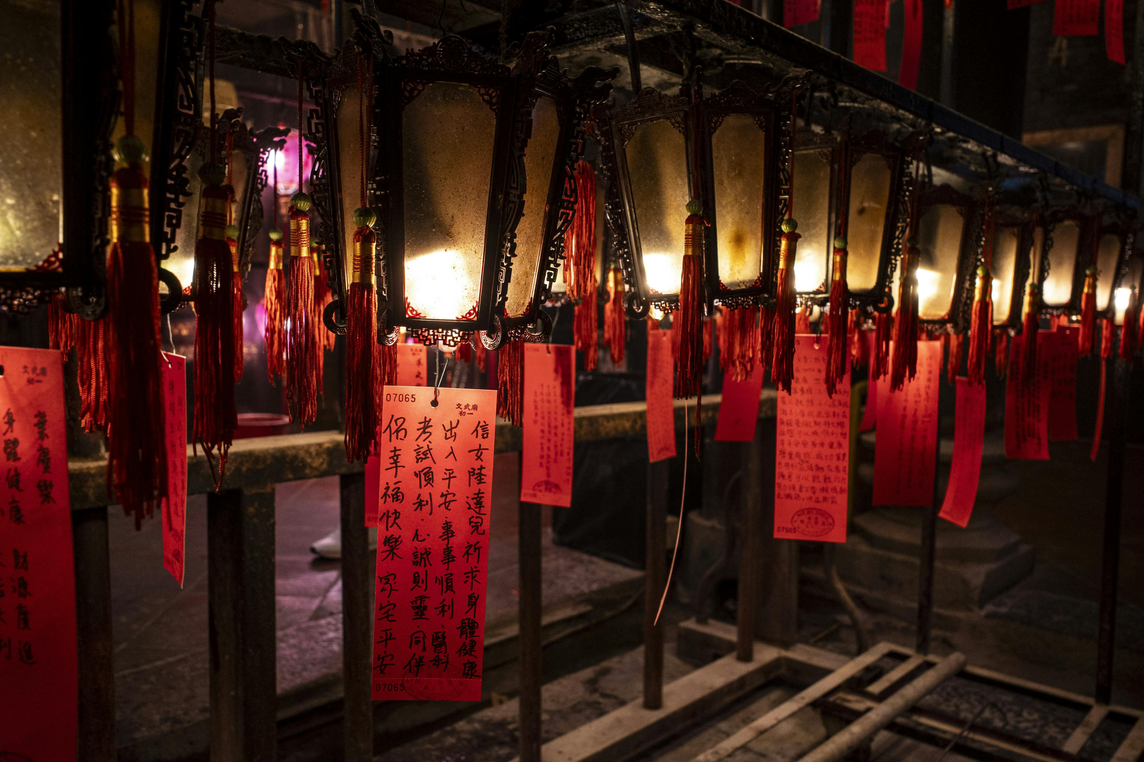 Lantern written with people’s wishes for the new year are seen at the Man Mo Temple, Hong Kong. 