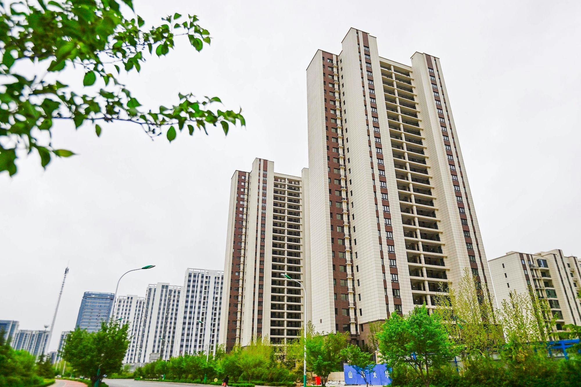Wohneigentum in China, Eigentum, Immobilien, Immobilienmarkt: ein kommerzielles Wohnbauprojekt, das in der Stadt Qingzhou in der ostchinesischen Provinz Shandong in Betrieb genommen werden soll.