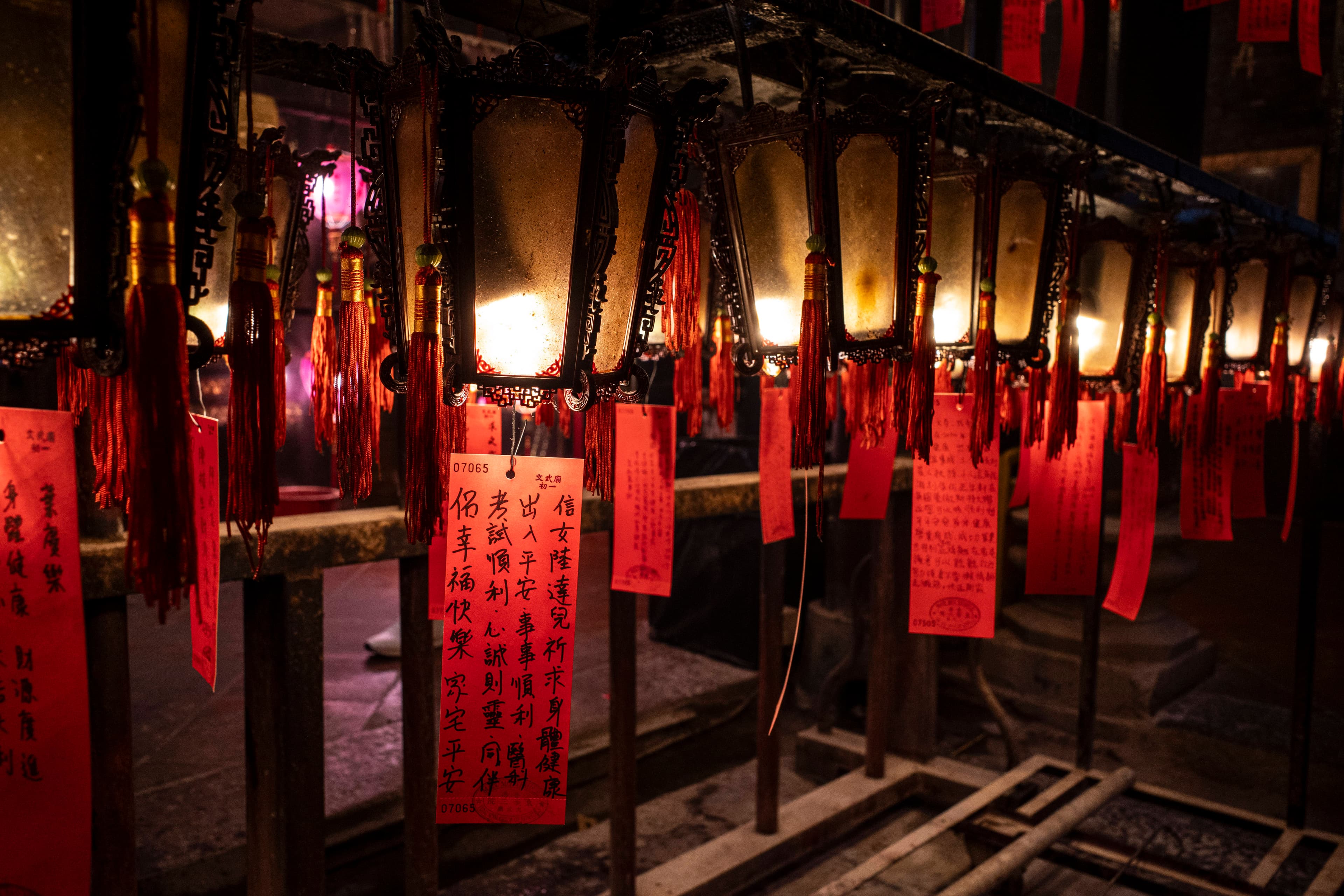 Lantern written with people’s wishes for the new year are seen at the Man Mo Temple, Hong Kong. 